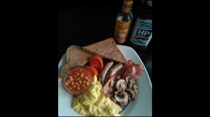 Full English breakfast with scrambled eggs